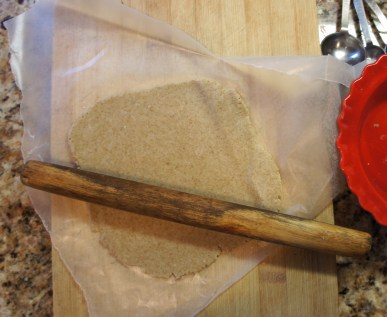 rolling out whole grain dough